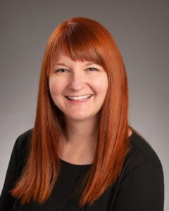 Headshot of Jeni Emerizy