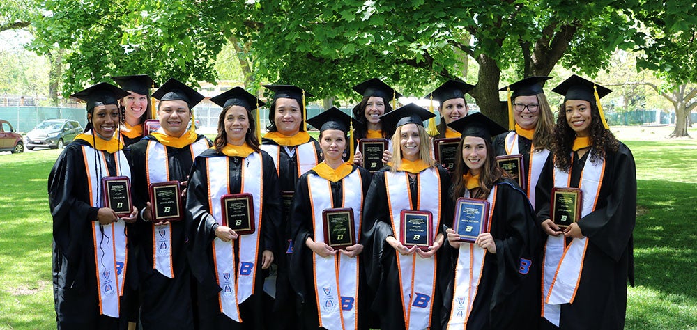 Students in commencement regalia