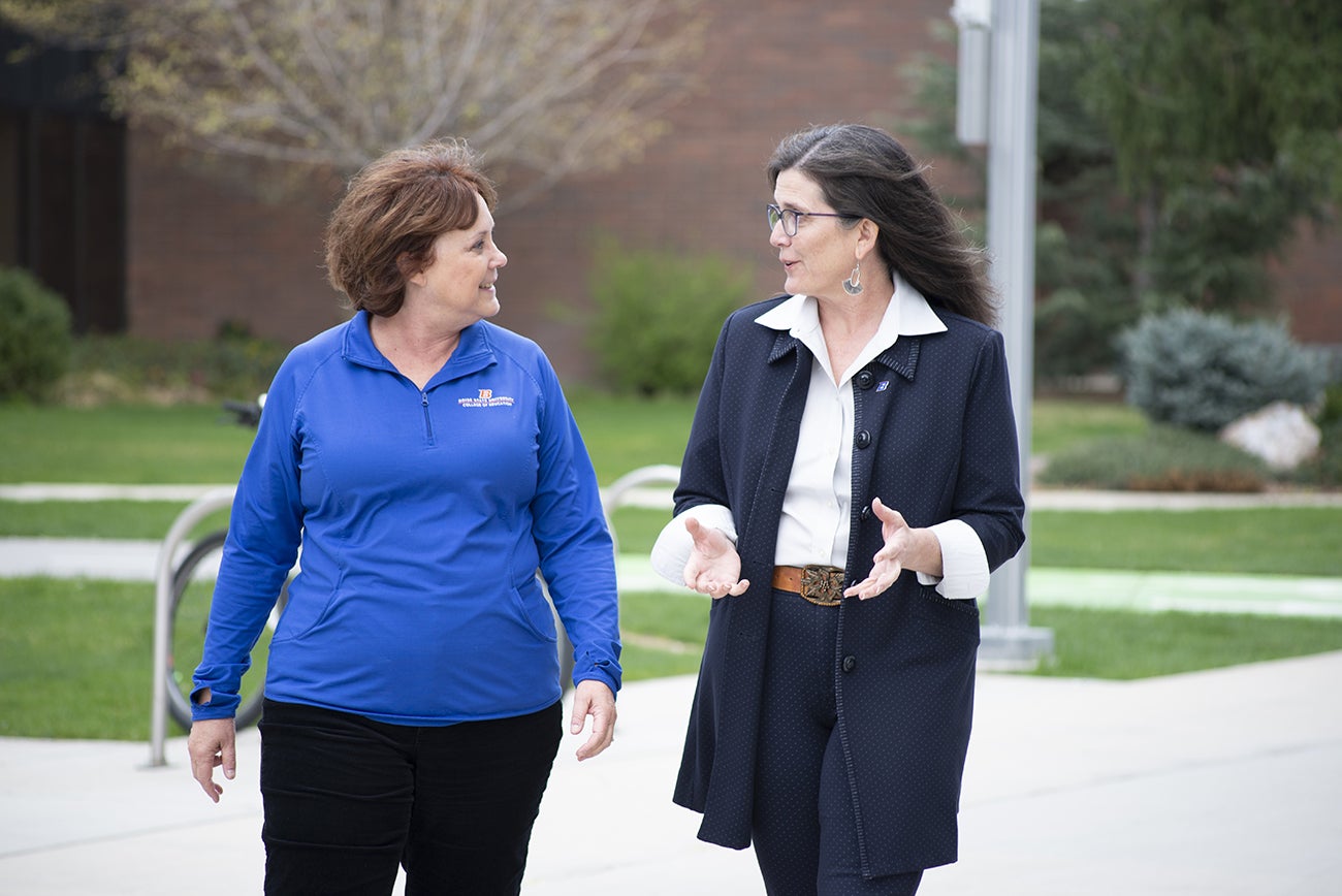 Sherry Dismuke, assistant dean of teacher education in the College of Education (left), and Heather Williams. “The workforce summit was an important step toward building partnerships with a diverse cross-section of Idaho’s educational stakeholders. If we are to solve the teacher retention problems in Idaho we will all need to work together to find collaborative solutions.” Dismuke said. PHOTO BY CARRIE QUINNEY