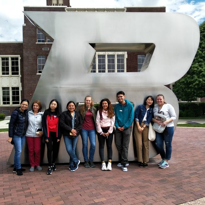 IEP students stand in front of big "B"