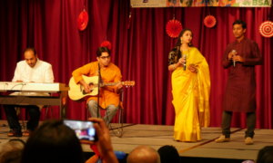 A student band performs on stage.