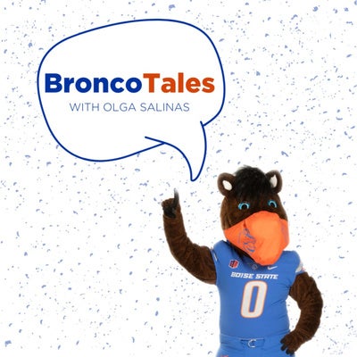 Buster Bronco pointing to a speech bubble that says: Bronco Tales, with Olga Salinas.