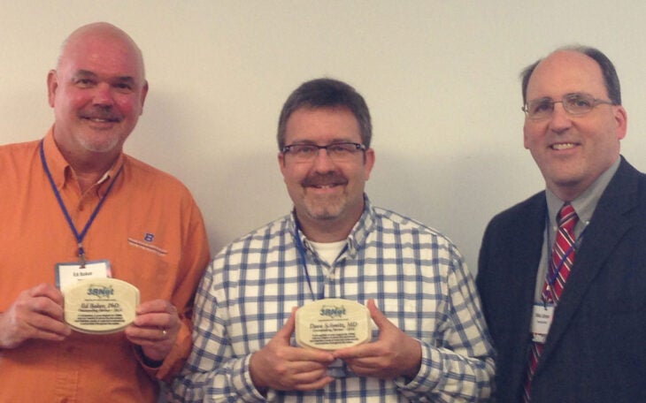 Ed Baker, Dave Schmitz, and Mike Shimmens, executive director of 3RNet.