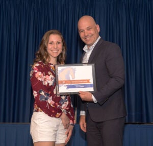 Holly Harper Receiving her award