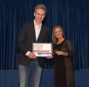 Jake Robertson Receiving his Award