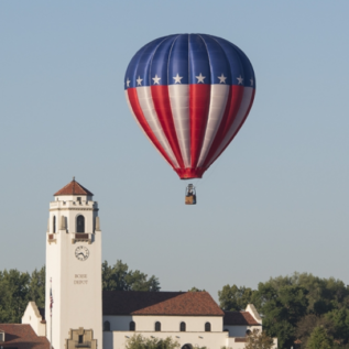 Hot air balloon in from of Boise Train Depot