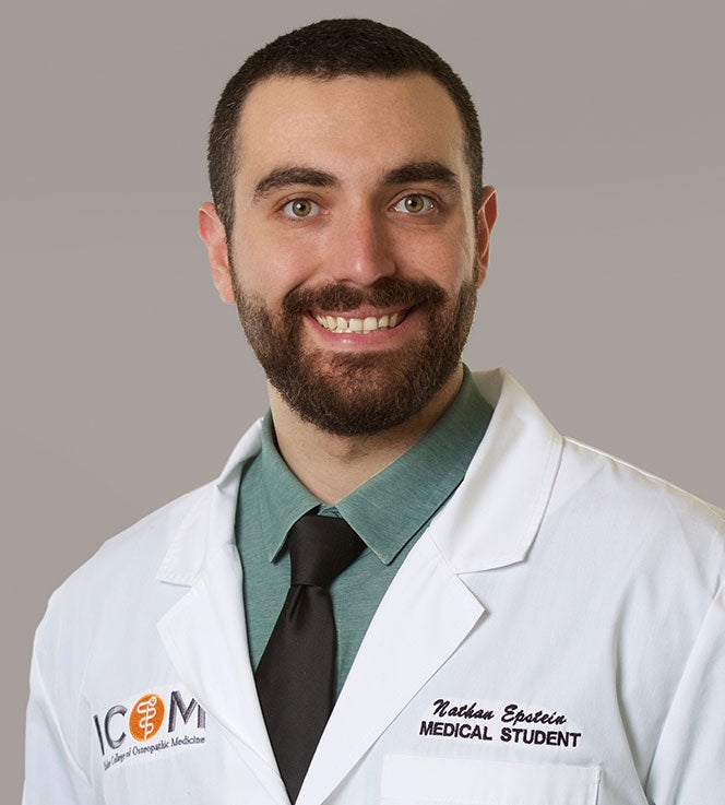 Nathan Epstein in white ICOM coat