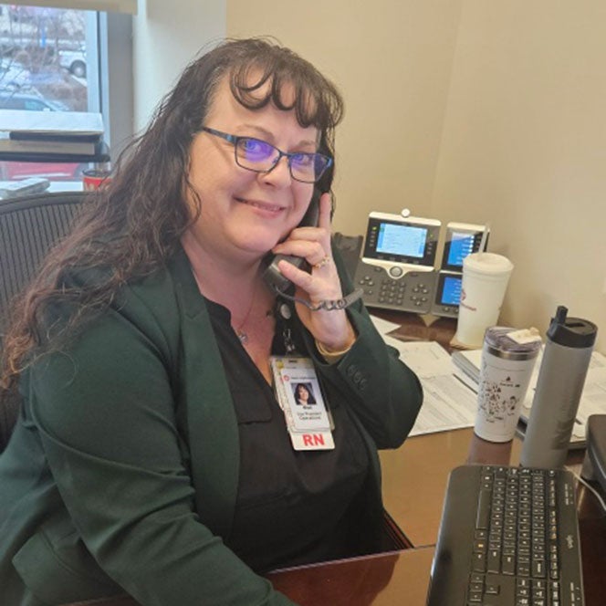 Misti Leavitt at her desk