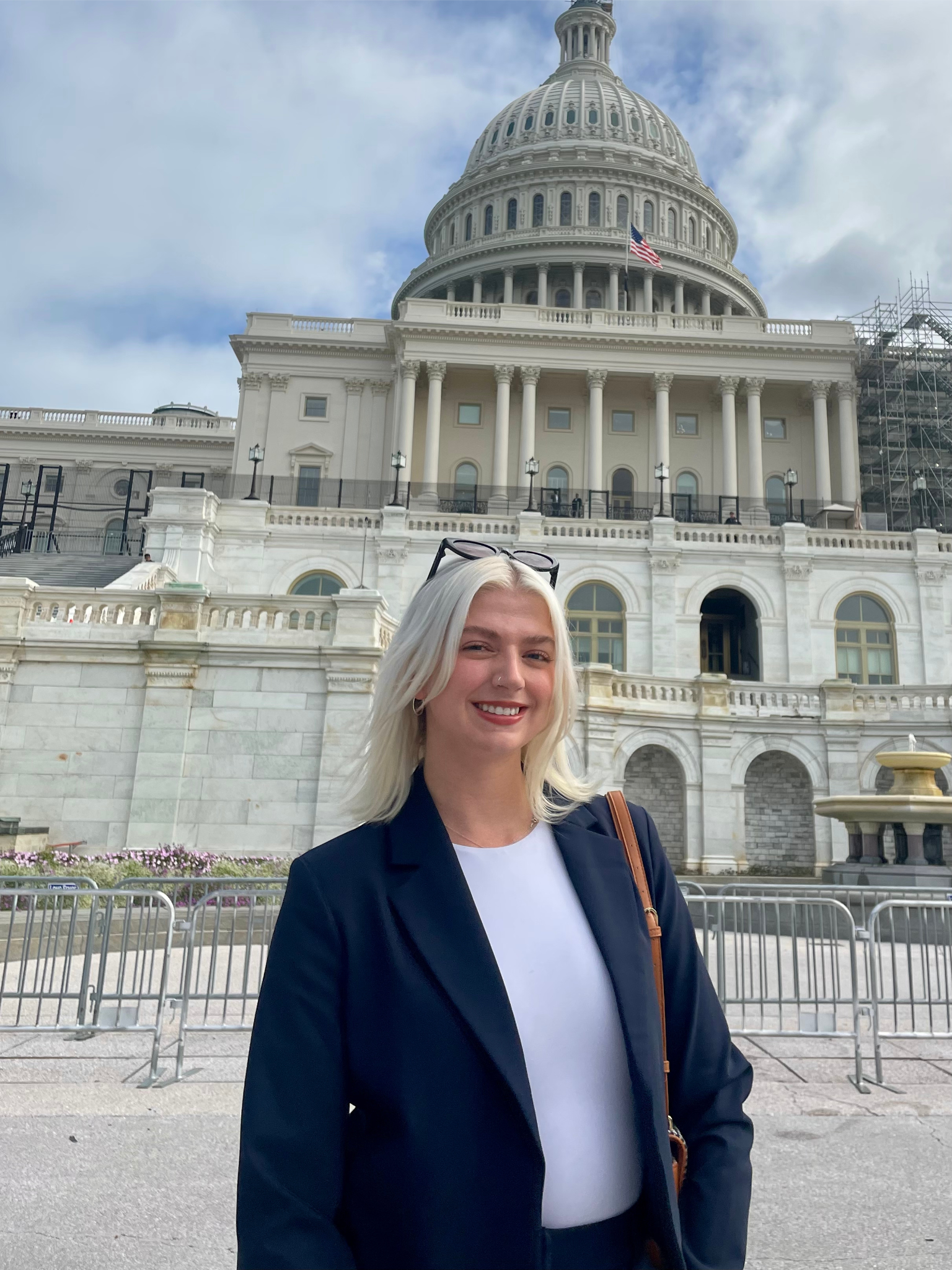 Kaydin standing in front of the U.S. capitol