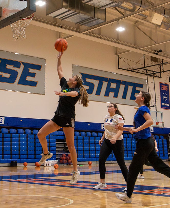 K-12 PE students play basketball during Instructional Basketball class in BroncoGym