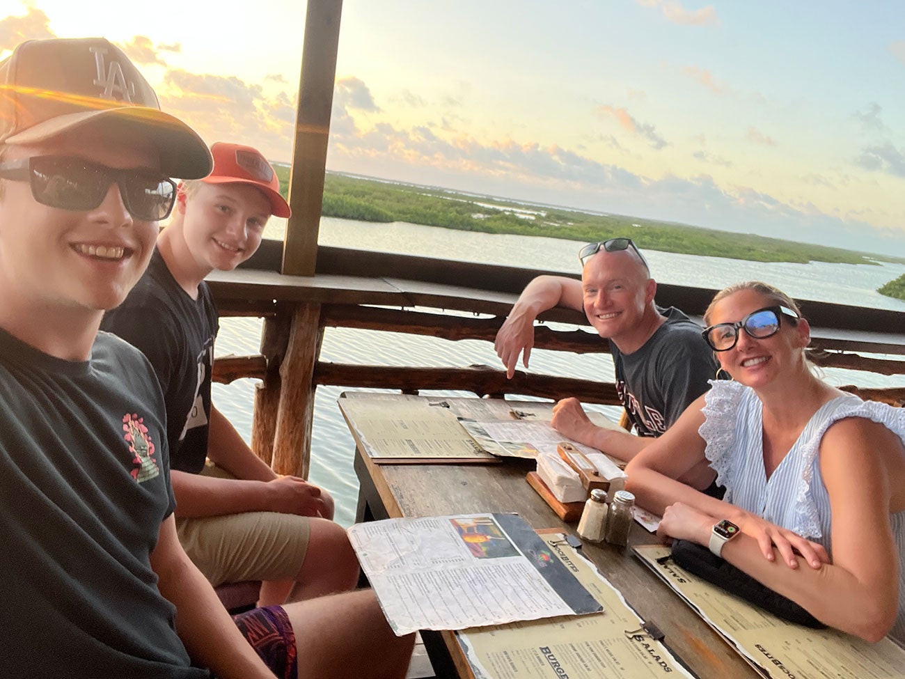 The Powers family at a restaurant in Ambergris Caye in Belize