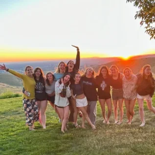 students watching the sunset
