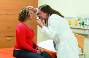 Student working with patient