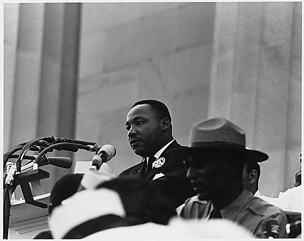 Dr. Martin Luther King, Jr. speaking at a Civil Rights March. 