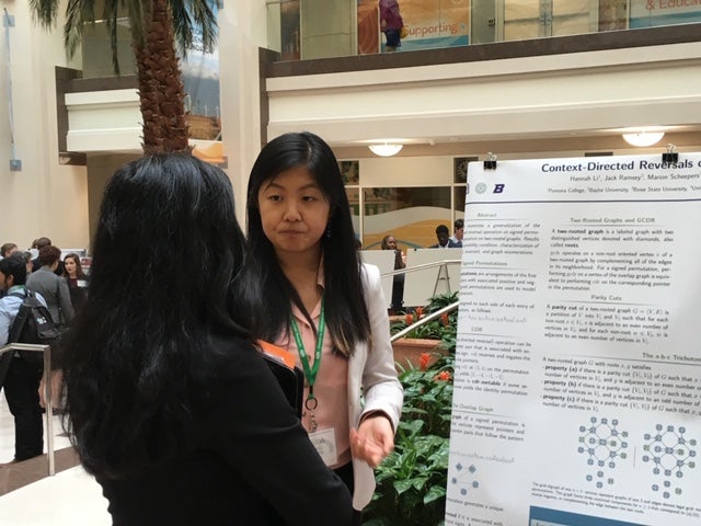Students presenting a poster