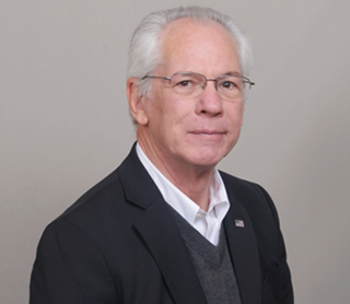 Headshot of Doug Hackler