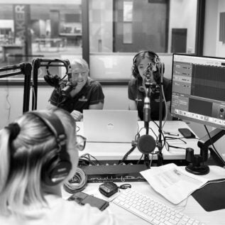 Dr. Amy Moll and IMER Program Manager Camille Platts-McPharlin in a recording room