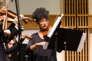 Students playing violins