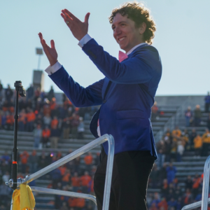 Band director standing on platform