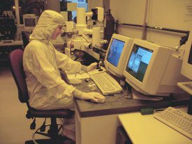 student working on computer in the Idaho Microfabrication Laboratory