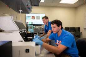 two people in a lab