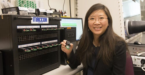 Claire Xiong displaying her research