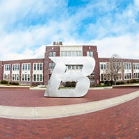 Picture of the B sculpture in front of the Boise State administration building