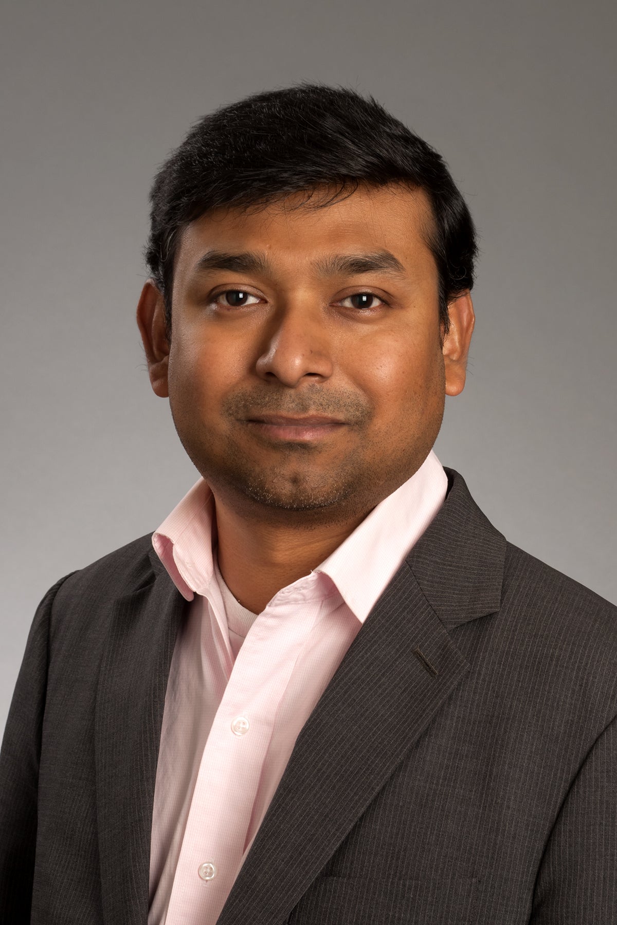 Studio portrait of Gautam Basu Thakur.
