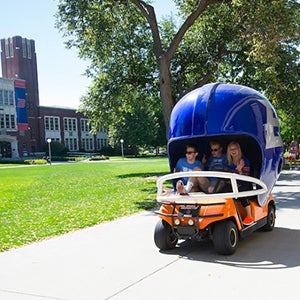 Students in the helmet car