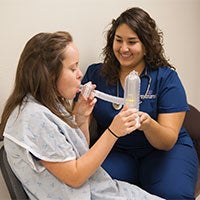 Respiratory Care student tests standardized patient air output