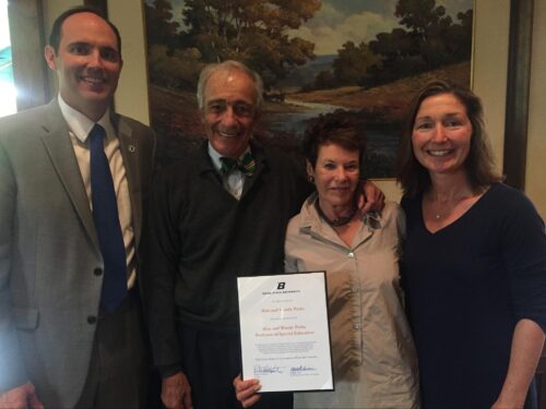Photo of Evelyn Johnson (right) with Alan and Wendy Pesky (center) and Rich Osguthorpe, dean of the College of Education. 