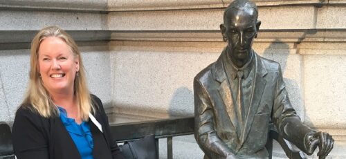 Lynn with a statue