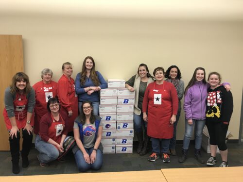 Volunteers send packages to military members