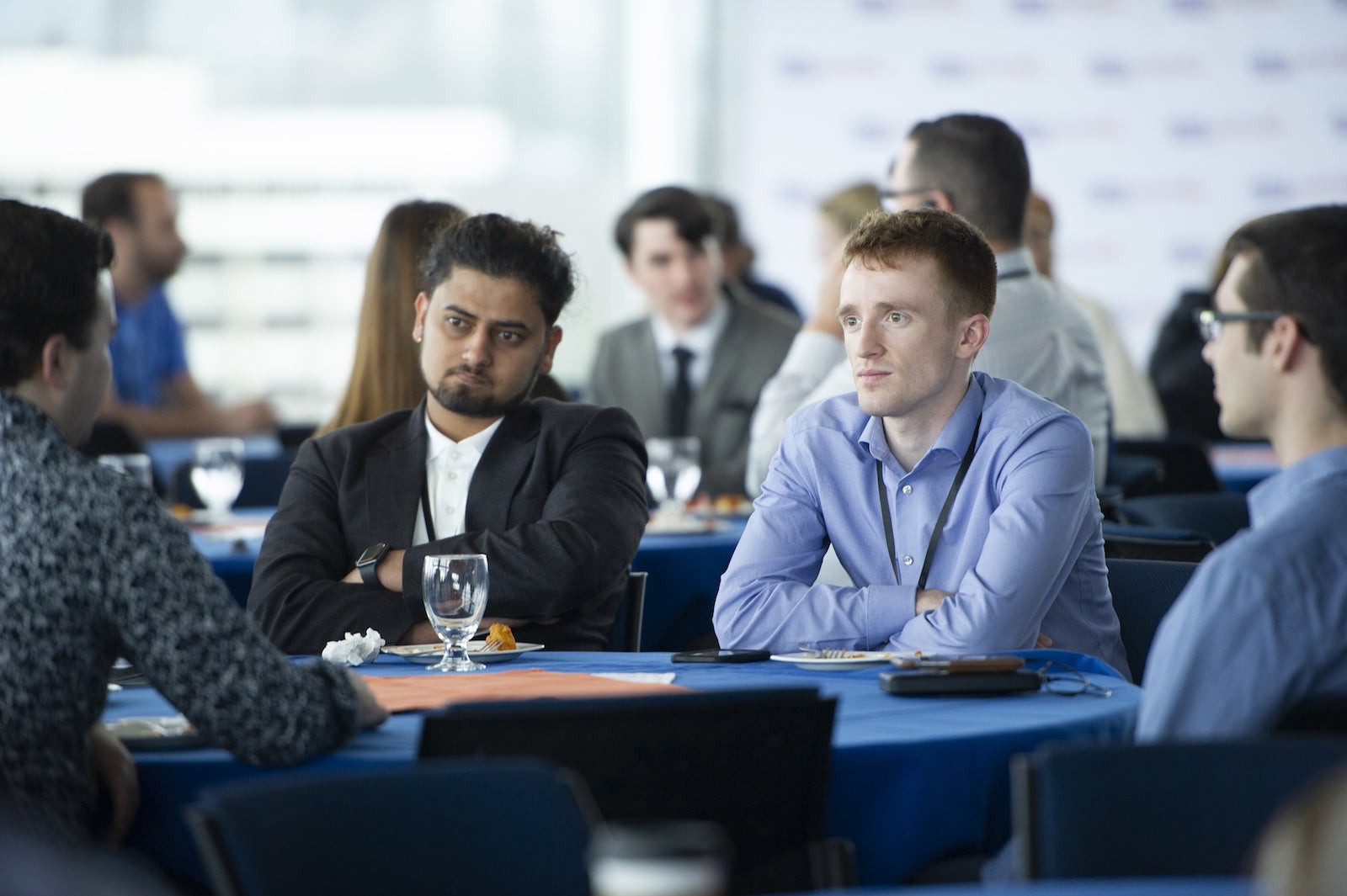 People sitting at a table during the entrepreneur challenge. 