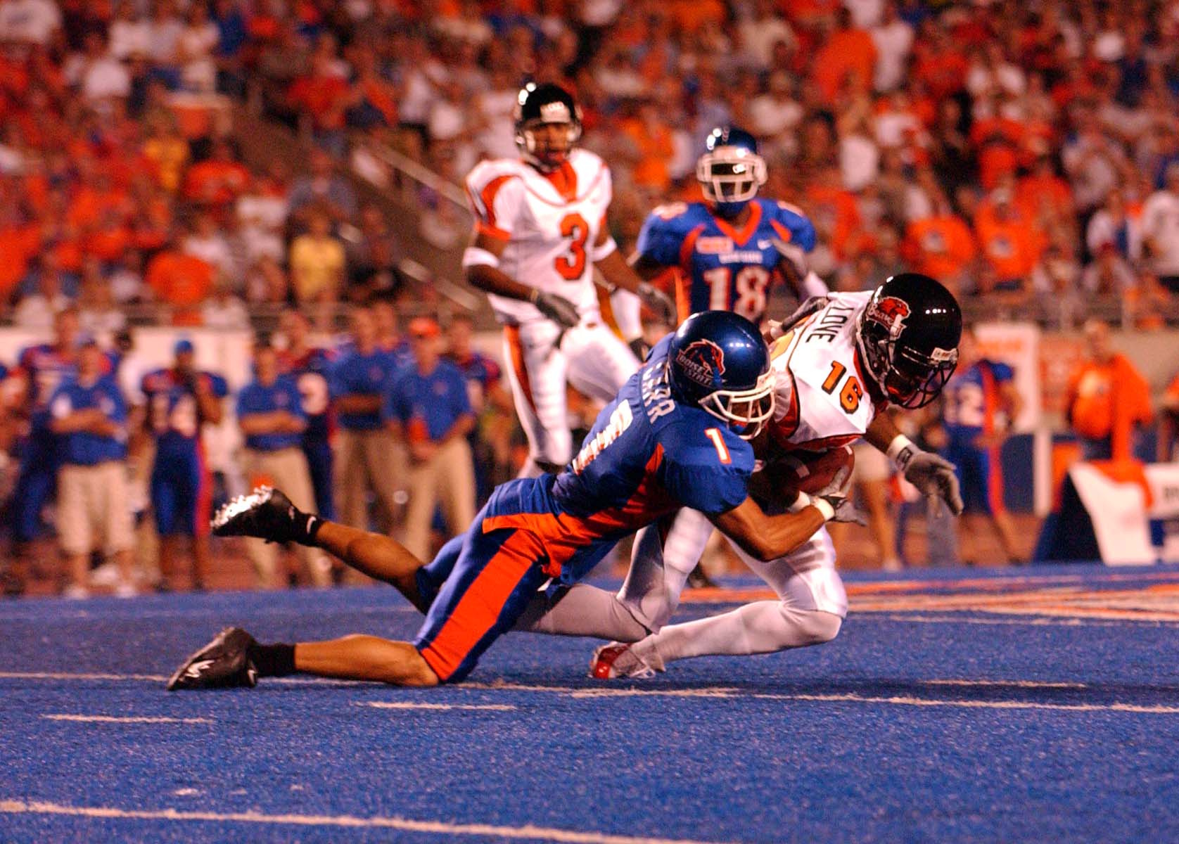 Chris Carr tackling someone