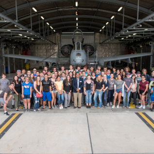 A large group of students posing at Gowen Air Force base