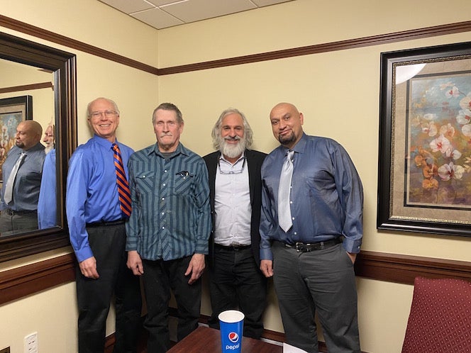 Hampikian with attorney and wrongfully convicted men.