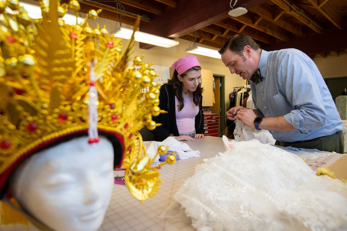 Darrin works on costumes