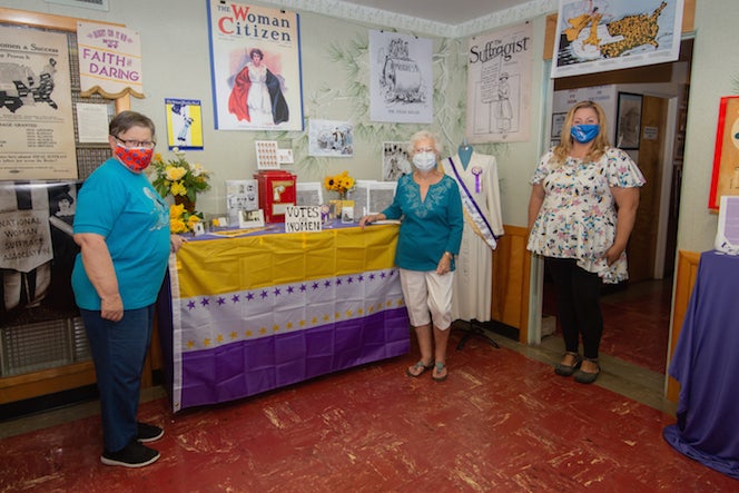 Shaina Lynch with museum volunteers