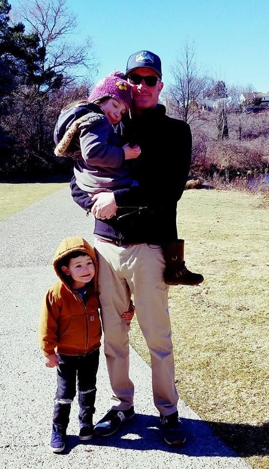 John with his children