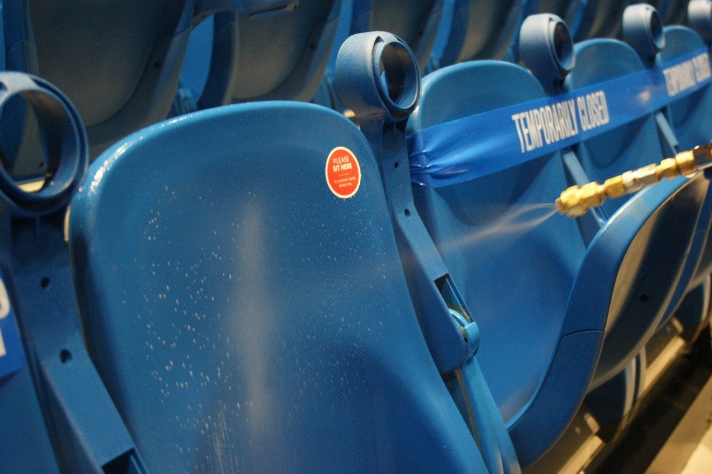 Seats are temporarily taped off in the arena. 
