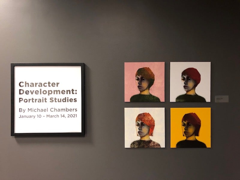 Four paintings on a wall