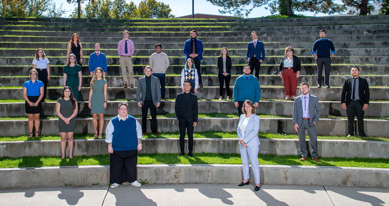 The 2021-2022 Boise State Talking Broncos debate team at the ampitheatre on campus.