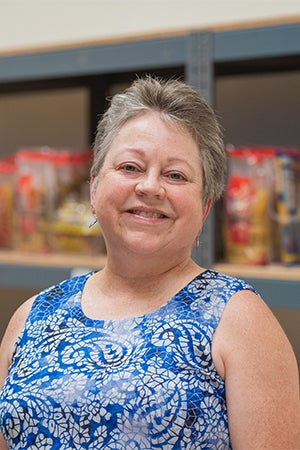 portrait of Tracy in food pantry