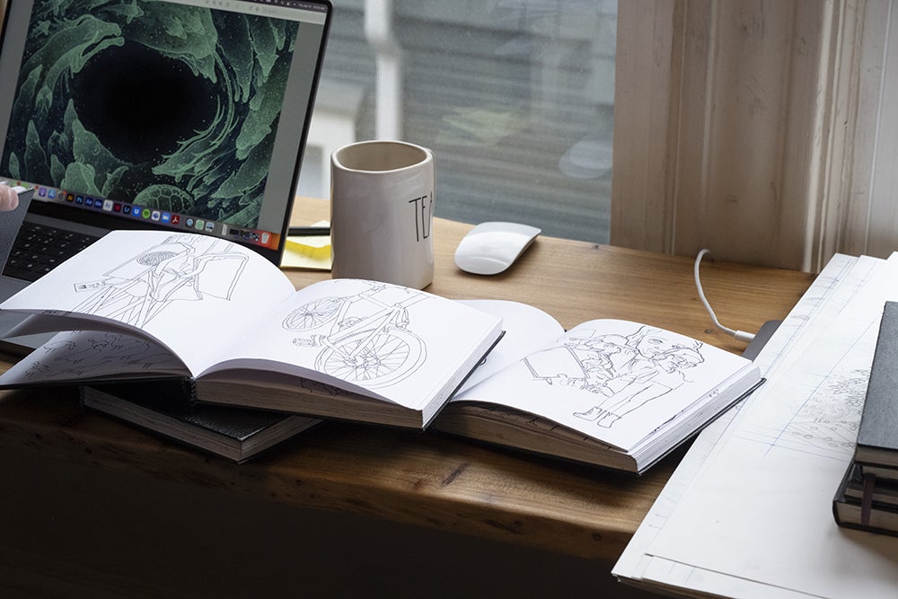 sketchbooks with various illustrations