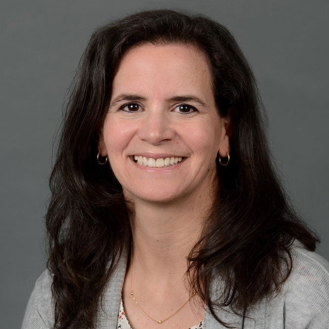 Headshot of professor Kate Doyon smiling