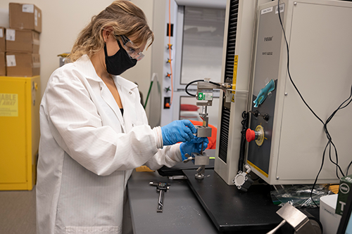 Terra in the Macromolecular Sciences Lab conducting experiments