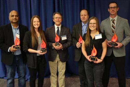 2023 OUR Mentors of the Year posing with their awards