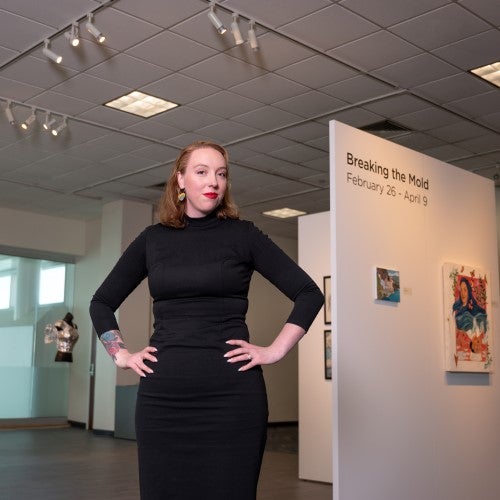 Mandee Snowden-Edmonds posing in art gallery.