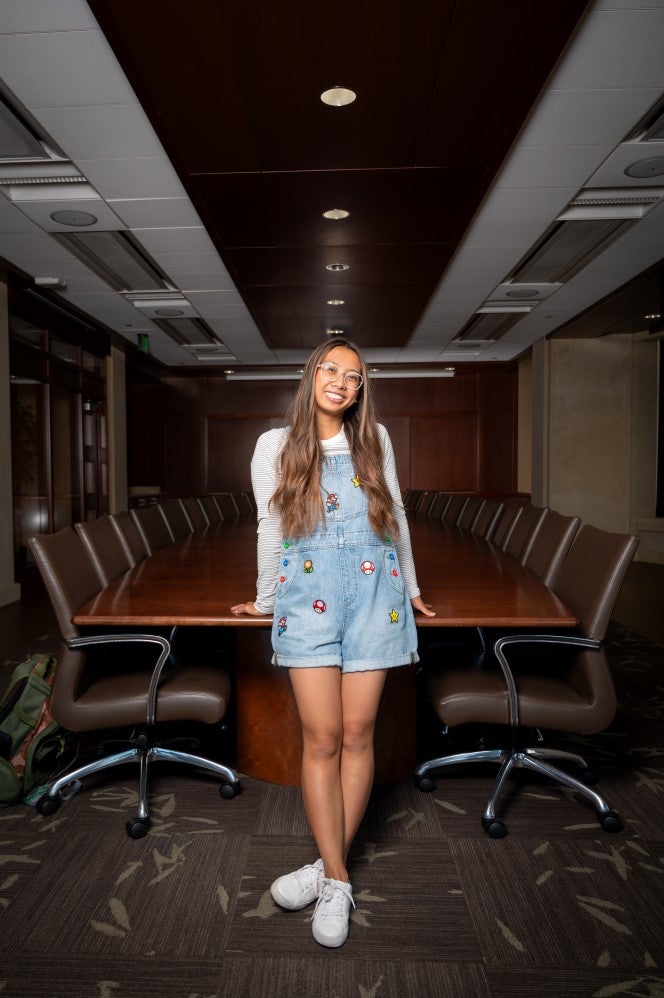 Devonne Busoy posing in boardroom